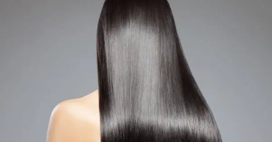 Long, shiny black hair cascading down a person's back